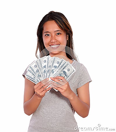Smiling asiatic young woman with cash money Stock Photo
