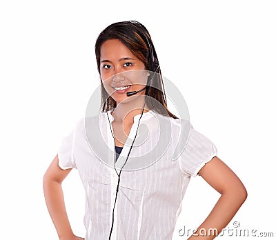 Smiling asiatic young woman using headphones Stock Photo