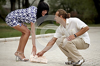 Smiling attractive couple meeting in summer park Stock Photo