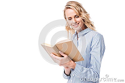 smiling attractive woman reading book Stock Photo