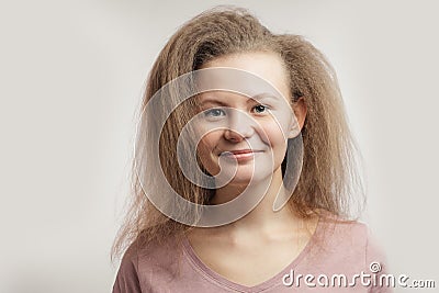 Smiling awesome girl uses good shampoo for hair Stock Photo