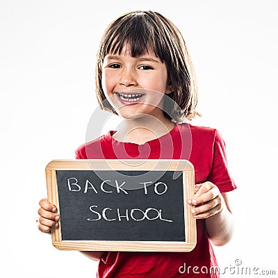 Smiling beautiful preschooler informing about cool back to school Stock Photo