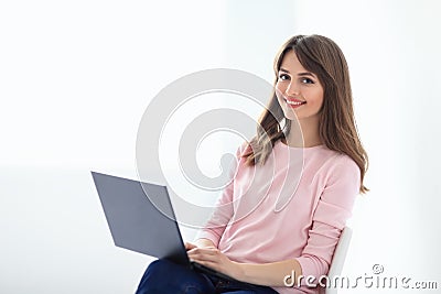 Smiling beautiful woman portrait with laptop Stock Photo