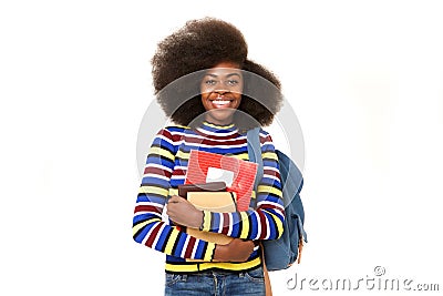 Smiling black female college student with books and bag against isolated white background Stock Photo