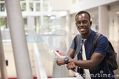 Smiling black male student in modern university, portrait Stock Photo