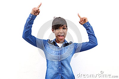 Smiling black woman pointing fingers up Stock Photo