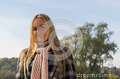 Smiling blonde girl. Portrait of happy cheerful beautiful young Stock Photo