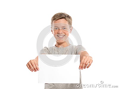 Smiling boy hold white blank paper Stock Photo