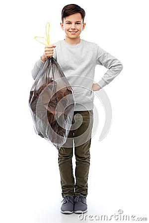 smiling boy with paper garbage in plastic bag Stock Photo