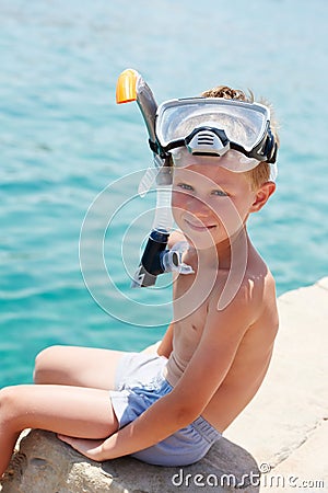 Smiling boy with snorkeling gear Stock Photo