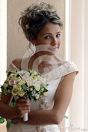 Smiling bride with bouquet Stock Photo