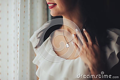 Smiling bride with olive branch in hands Stock Photo