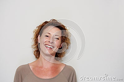 Smiling brunette woman on white background Stock Photo