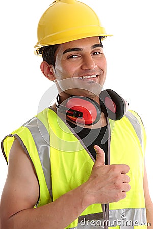 Smiling builder thumbs up Stock Photo