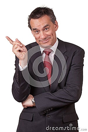 Smiling Business Man Pointing Left Stock Photo