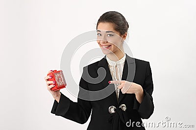 Smiling business woman with alarm in his hand Stock Photo