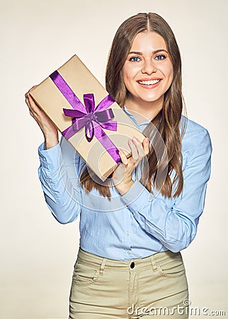 Smiling business woman holding gift box Stock Photo