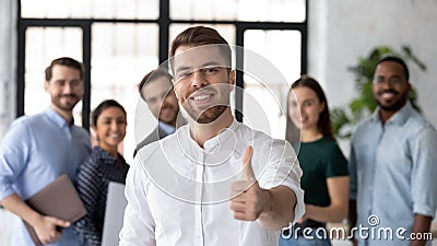 Client pleased with service showing thumbs up express positive feedback Stock Photo