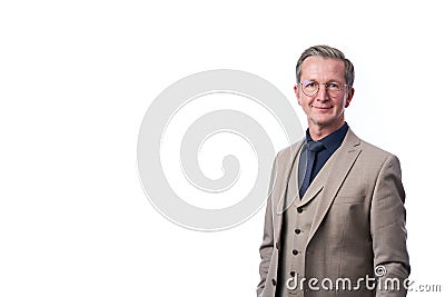 Smiling businessman portrait. Successful business man wearing light suit. Stock Photo