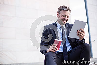 Smiling businessman after successful workday Stock Photo