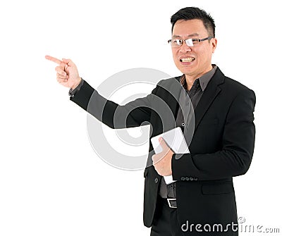 Smiling Businessman holding mobile device pin point on something isolated on white background Stock Photo