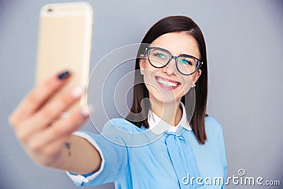 Smiling businesswoman making selfie photo Stock Photo