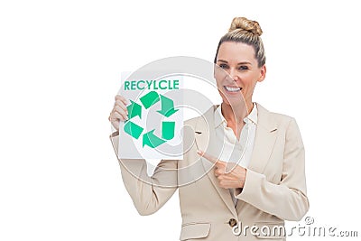 Smiling businesswoman promoting recycling and environment Stock Photo