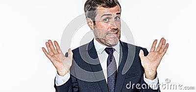 Smiling careless bearded businessman refusing accusation, acting like an hypocrite Stock Photo
