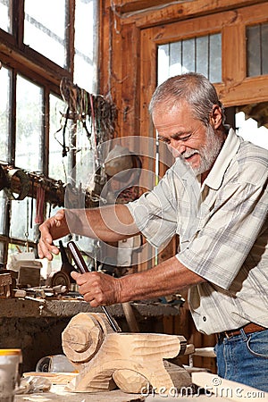 Smiling carpenter Stock Photo