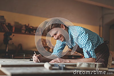 Smiling carpenter the carpentry Stock Photo