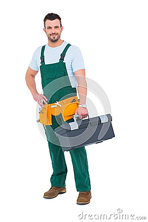 Smiling carpenter with toolbox Stock Photo