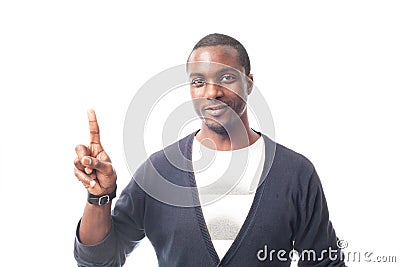 Smiling casual dressed black man gesturing with finger. Stock Photo