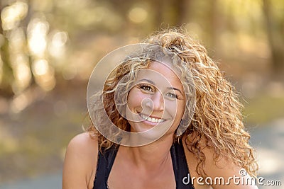 Smiling charismatic young woman Stock Photo