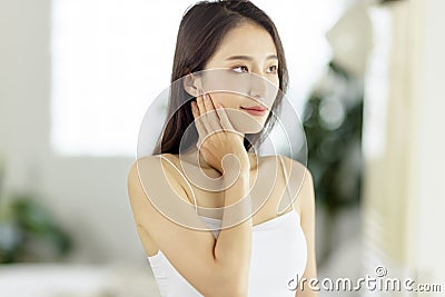 Smiling of cheerful beautiful pretty asian woman with clean fresh healthy skin Stock Photo