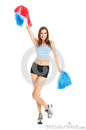 Smiling cheerleader girl posing with pom poms Stock Photo