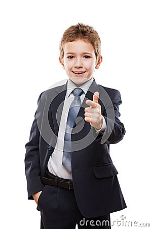 Smiling child boy in business suit index finger pointing direction way or campaign agitating choice Stock Photo