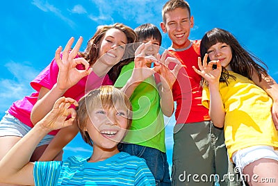 Smiling children's okay signs Stock Photo