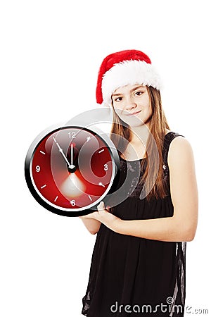 Smiling christmas girl holding oclock over white Stock Photo