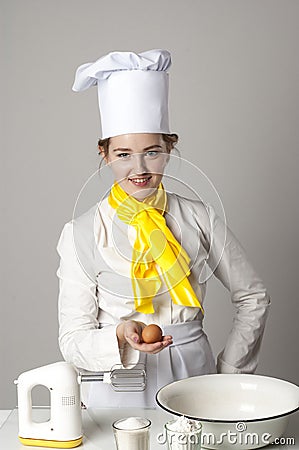 Smiling cook in kitchen Stock Photo