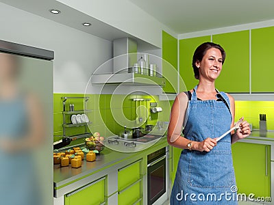 Smiling cook in a modern kitchen Stock Photo