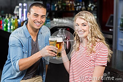 Smiling couple drinking beer Stock Photo