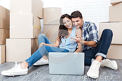 Smiling couple ready to move out Stock Photo