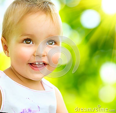 Smiling Cute Baby Girl Stock Photo