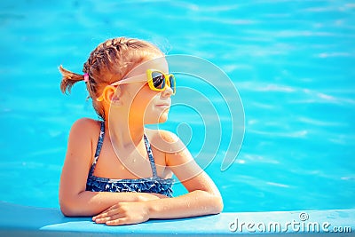 Cute girl in pool Stock Photo