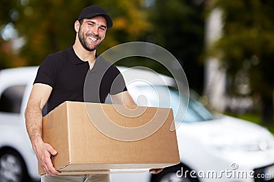 Smiling delivery man Stock Photo