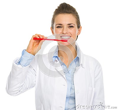 Dental doctor woman showing how to clean teeth Stock Photo