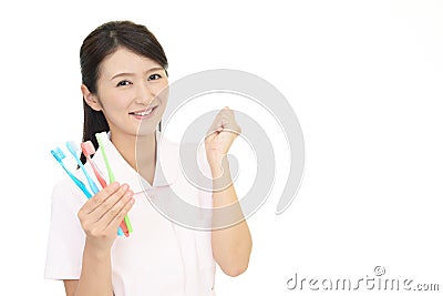 Smiling dental hygienist Stock Photo