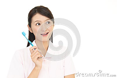 Smiling dental hygienist Stock Photo