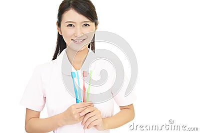 Smiling dental hygienist Stock Photo