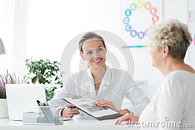 Smiling dietician with her patient Stock Photo